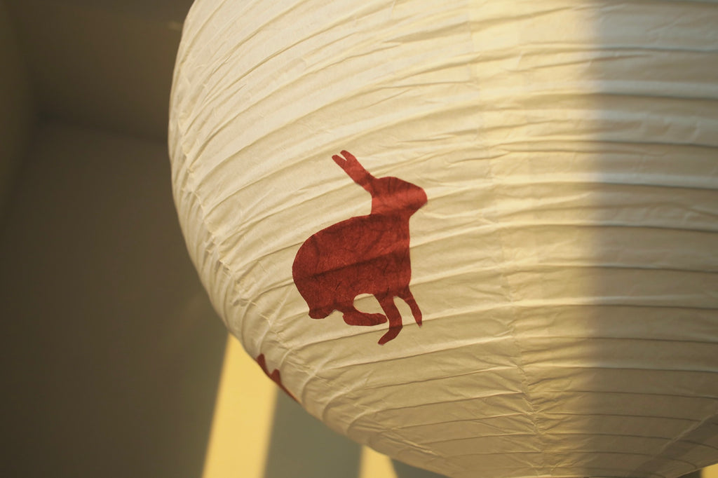Close-up of handmade mulberry paper texture on Whimsy Bunny lamp shade