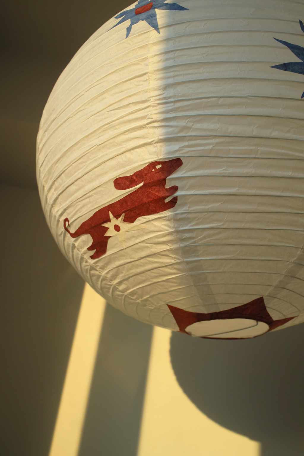 Close-up of handmade mulberry paper texture on Whimsy Dachshund lamp shade